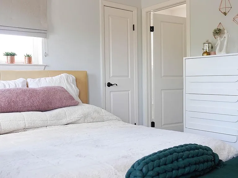 2nd floor primary bedroom with 2 closets (small closet pictured)
