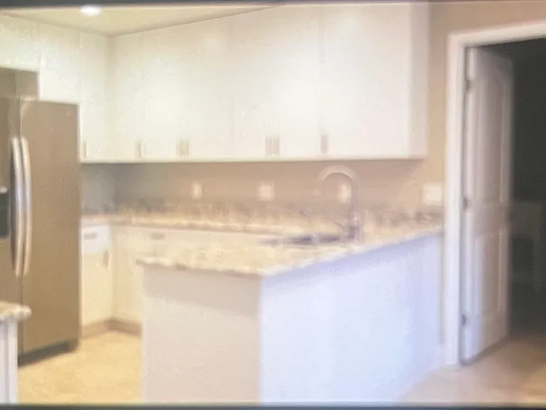 New kitchen and appliances in 2018: overlooks a brick walled back yard: very private.
