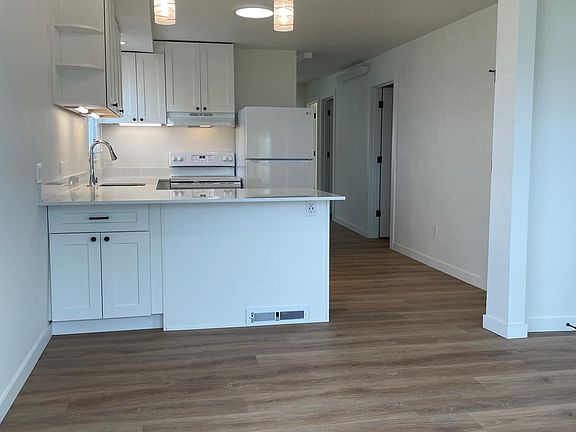 Dining area looking to breakfast bar.