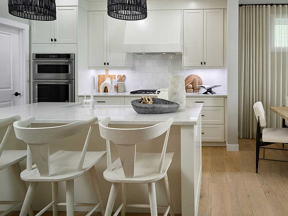 A photo of the kitchen in the Purcell 26 show home in Calgary by Brookfield Residential