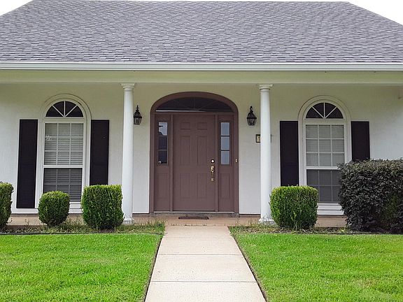Beautiful porch and entry to this custom built home.