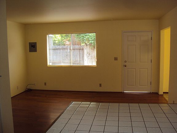 Cozy living room with views into private yard