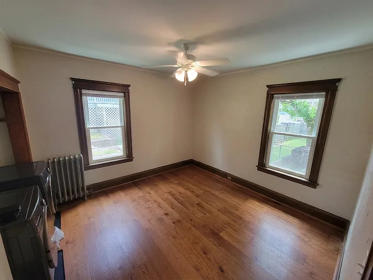 Bedroom with washer/dryer off Kitchen
