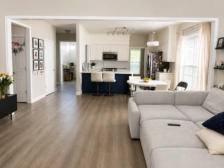 Open floor plan from kitchen to living area.