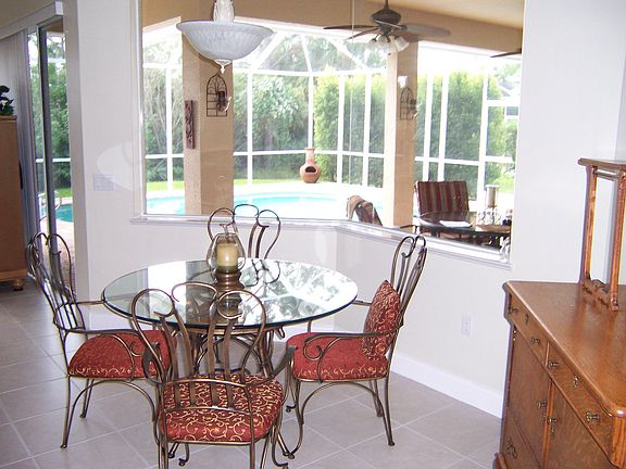 Dining nook overlooking pool area