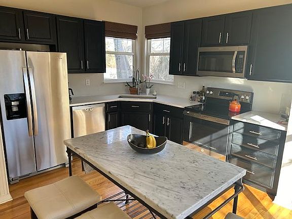 Beautiful kitchen with quartz counters and new appliances