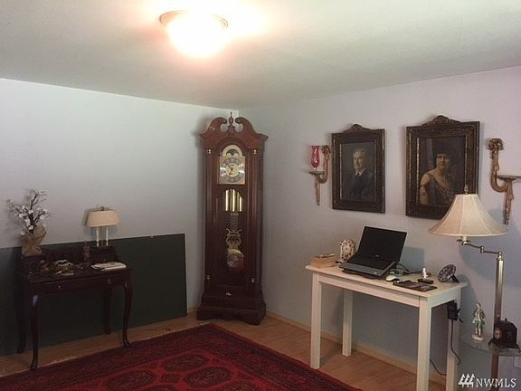 French doors off the entry way lead you to a separate study or office area