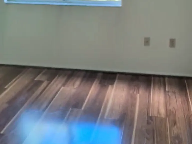 Bedroom with nice natural light from window and a slider to a private lanai
