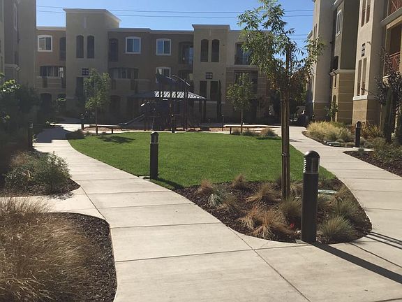 GREEN AREA WITH PLAY STRUCTURE