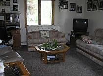 Charming Family Room with a lovely view of Manistee Lake.