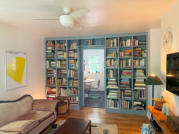 Living room with built in bookshelves