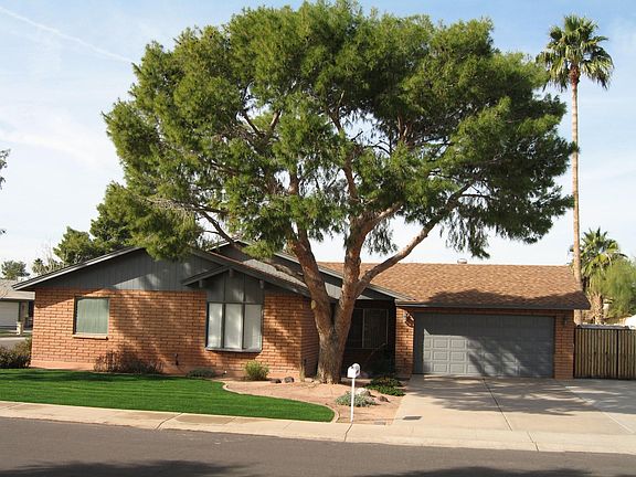 Brick Home has a Deep Driveway and has room for 3rd Car Parking