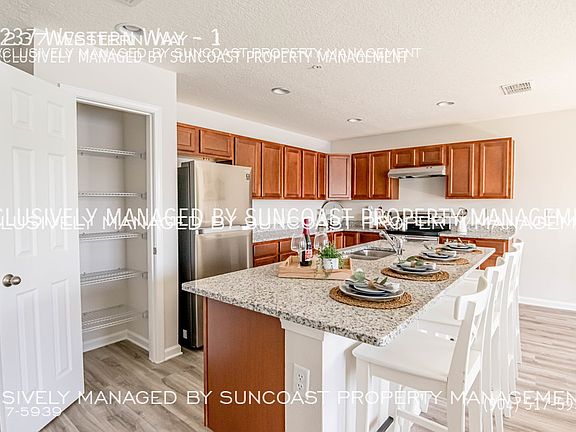 2nd image of 9237 Western Way #1