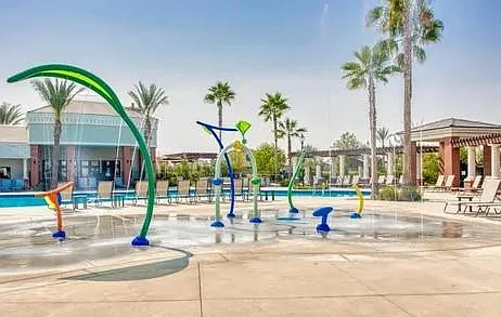 The water park next to the swimming pool