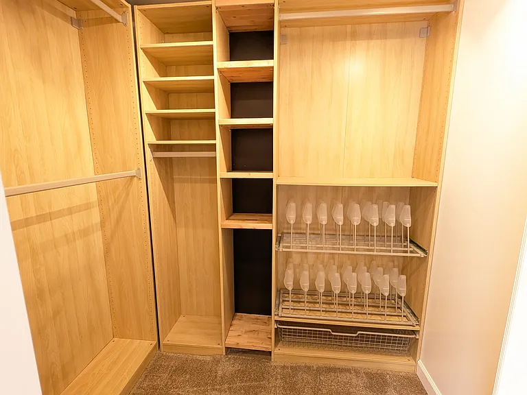 Large master closet with customizable closet system.
