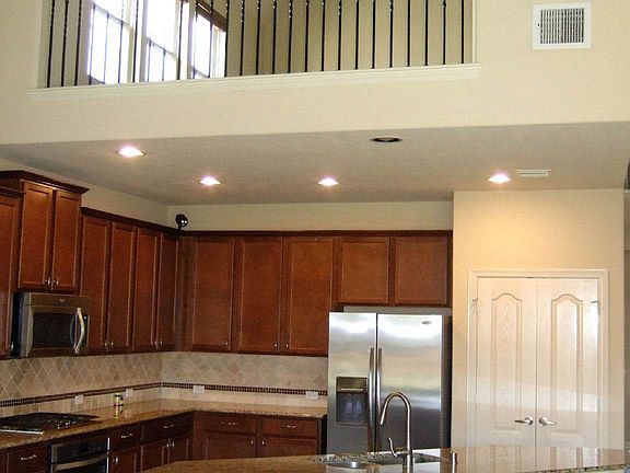 View from Living Room to Kitchen and Gameroom.