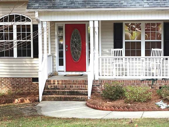 Covered Rocking Chair Front Porch awaits you and some iced tea on a breezy summer afternoon.