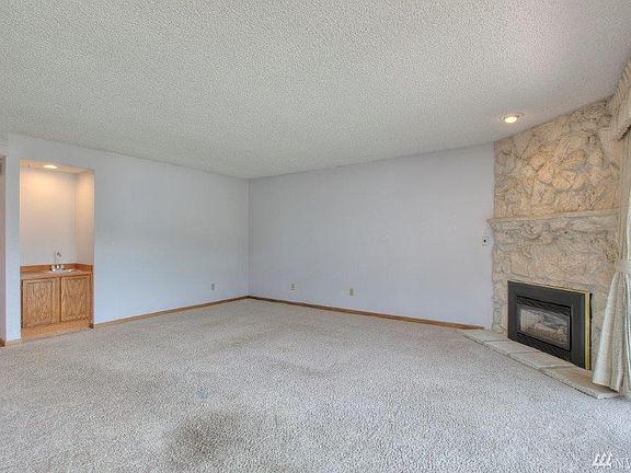 Spacious living area with sliders to extra large patio.
