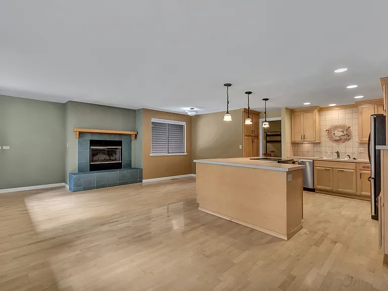 Coming back inside to the family room and kitchen from the deck