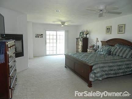 Oversized Master Suite!
						:
						Sliding doors to 2nd level deck, fire place, ceiling fans, walk-in-closet!