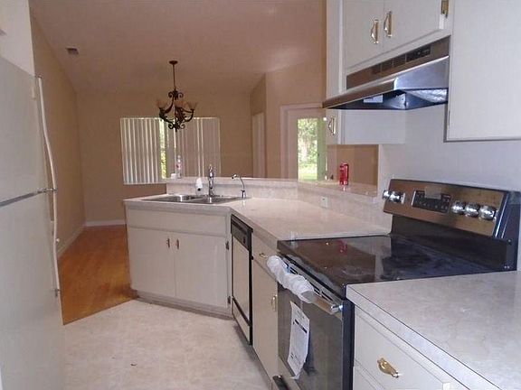 Lots of counter and storage space in the kitchen. Washer and dryer located just off the kitchen.
