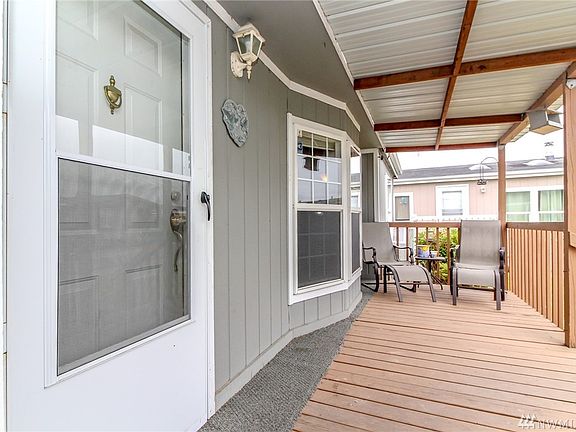 Really well built covered front deck is like having an extended living area.
