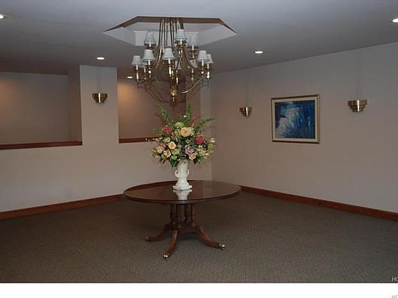 foyer that leads you to the elevator