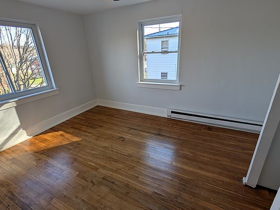 Front BR recently refinished oak hardwood floors and fresh paint