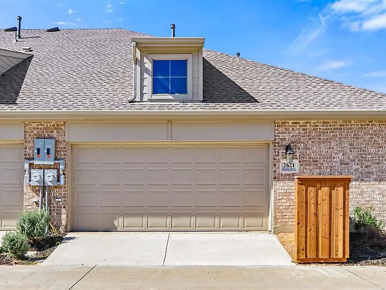 This gorgeous home has a two-car garage.