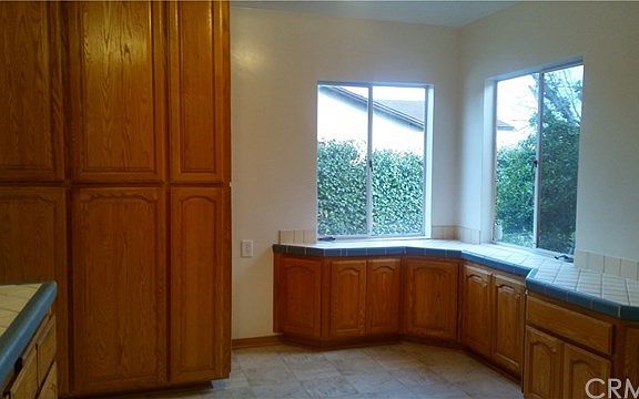 Plenty of cabinets and counter space in this kitchen, new flooring through out the home