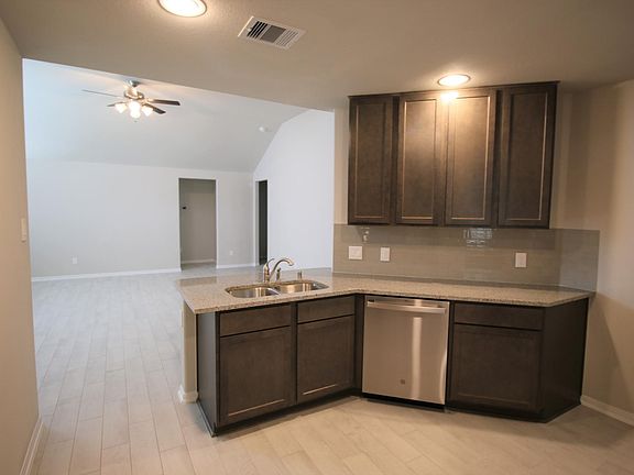 Kitchen looking into Family Room