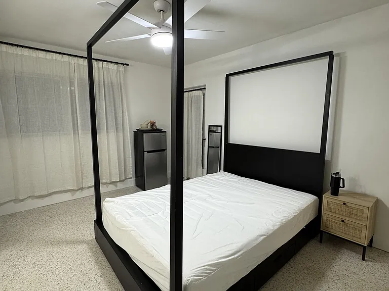 Queen bed & 43" TV, mini-fridge & desk, (2) closets,