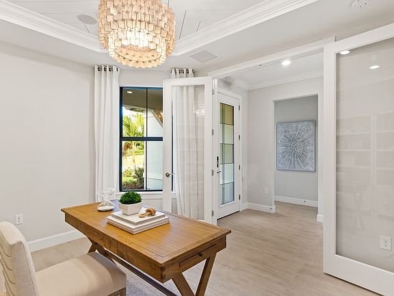 Enclosed flex room with doors, perfect for a home office or hobby room