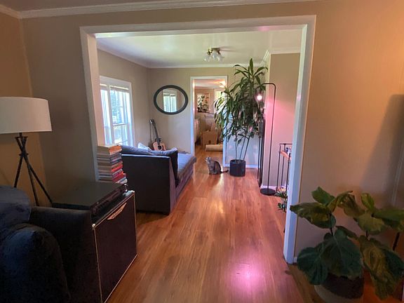 Large open space from living room through dining area and looking into kitchen