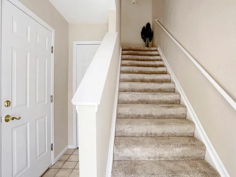 Entry to townhouse and stairs to main floor