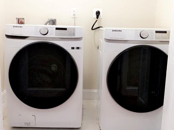 Washer and dryer in the unit