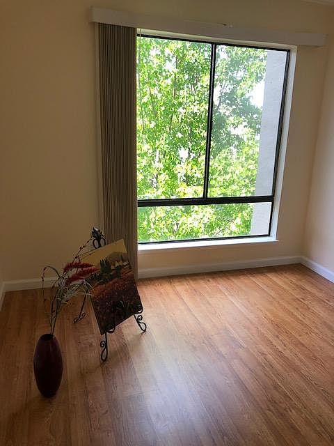 bedroom looking out window.