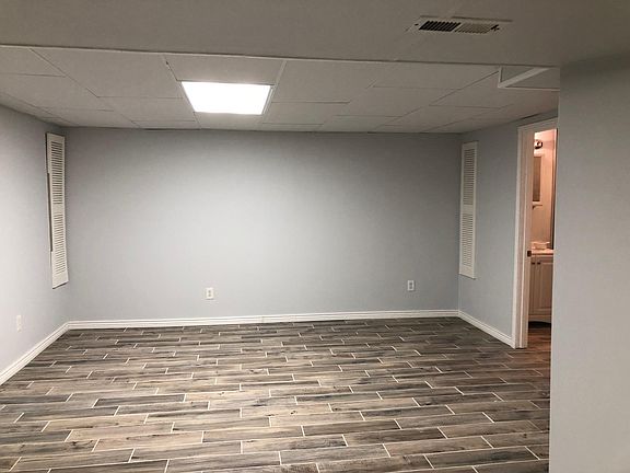Open concept 2 with beautiful tile floor. Very large area