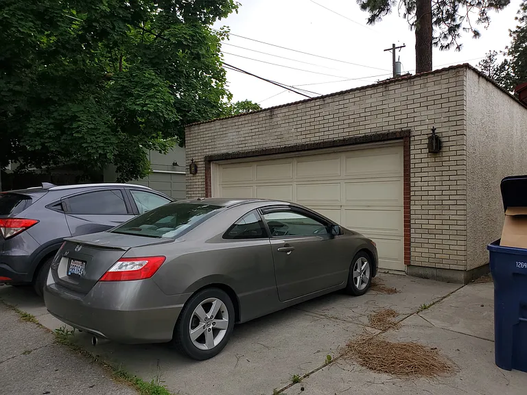 Two car detached garage with a garage opener.