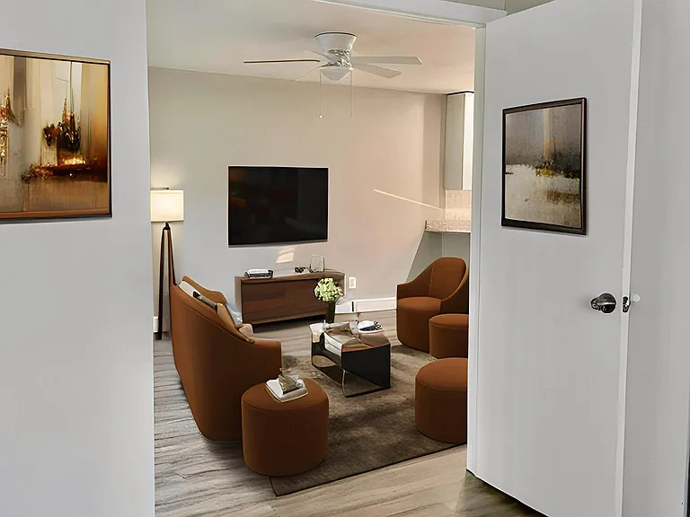 Large bedroom with double doors open to living space.