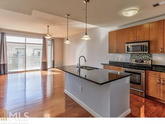 2nd image of 711 Cosmopolitan Dr NE Unit 416