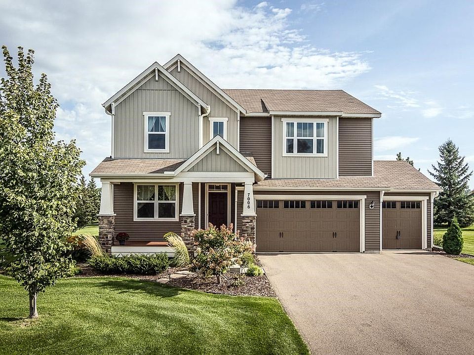 Lush landscaping accents the exterior of this quality built Pulte home sitting on an oversized .85 acre lot
