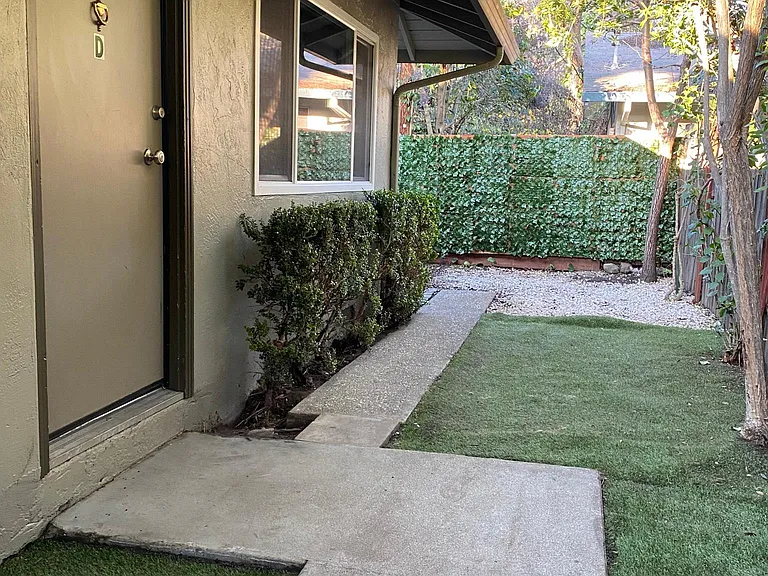 side yard with view of backyard