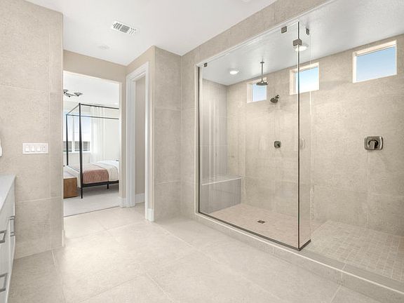 Oversized walk-in shower in the owner s bath