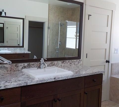 Beautiful counters and wood cabinets
