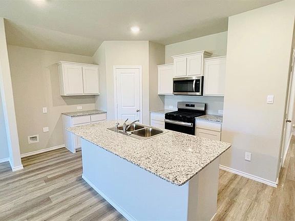 Kitchen - All Home and community information, including pricing, included features, terms, availability and amenities, are subject to change at any time without notice or obligation. All Drawings, pictures, photographs, video, square footages, floor plans, elevations, features, colors and sizes are approximate for illustration purposes only and will vary from the homes as built.
