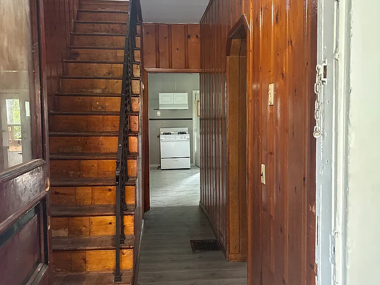 Hallway from foyer to kitchen and stairway