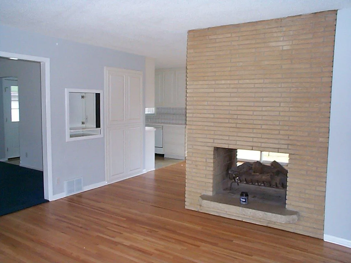 See Through Fireplace between Living Room and eating area off Kitchen - 2501 Ford Rd