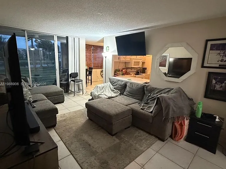 9441 Live Oak Pl #209 — Photo 1