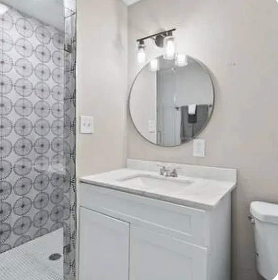 Master Bathroom- Ensuite to Master Bedroom and Guest Bedroom 3.
Single vanity, Large stand-up shower w/glass enclosure